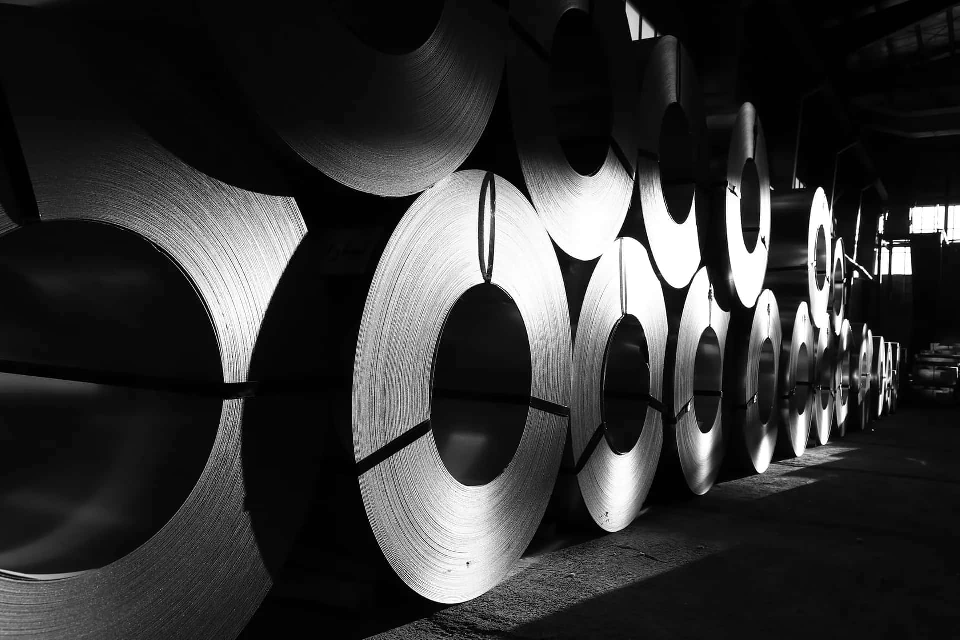 Rows of steel coils in a warehouse