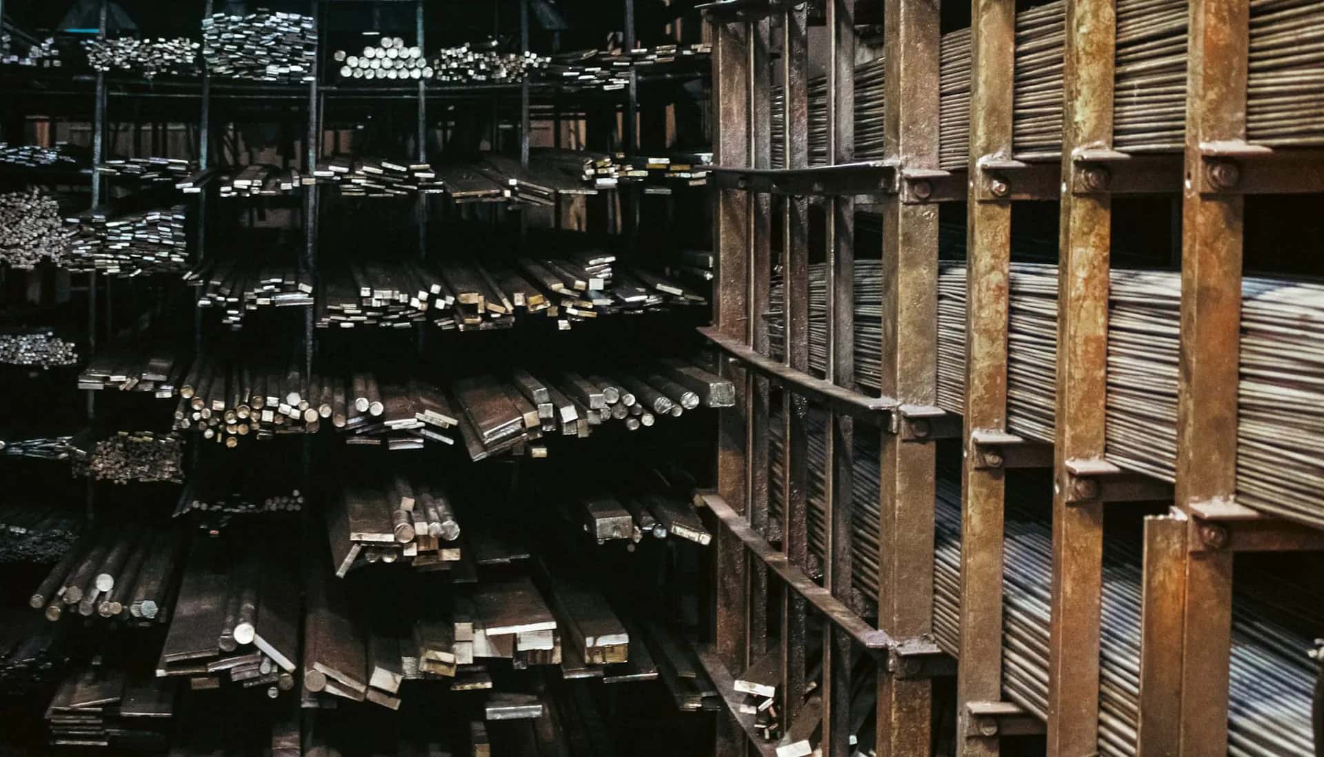 Steel bars and flats stored on stockyard racks