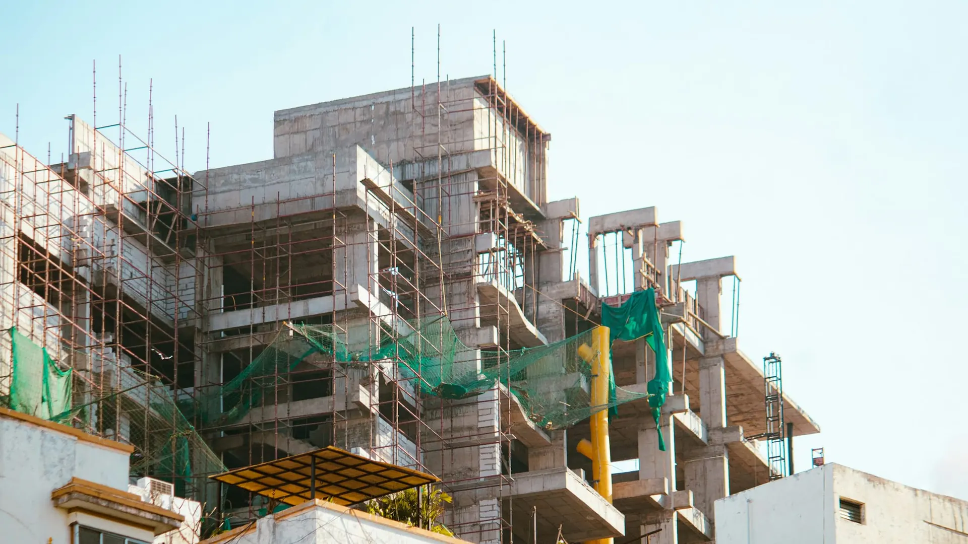 Building under construction with scaffolding