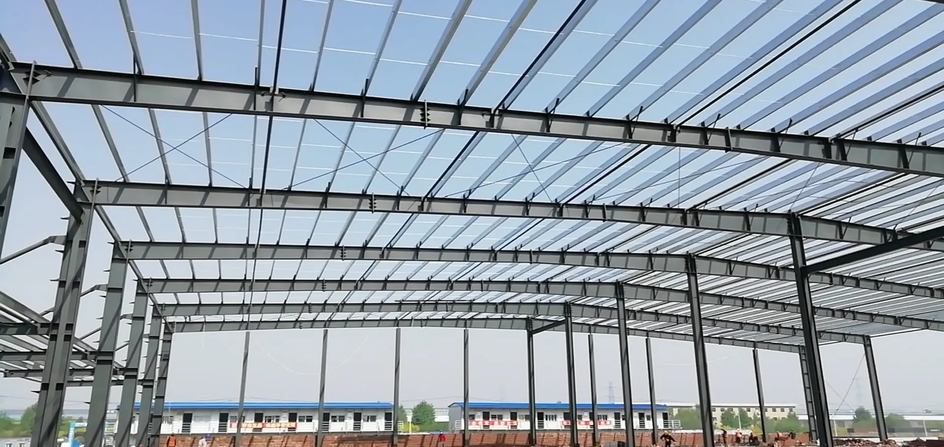 Pre-engineered steel building frame under construction