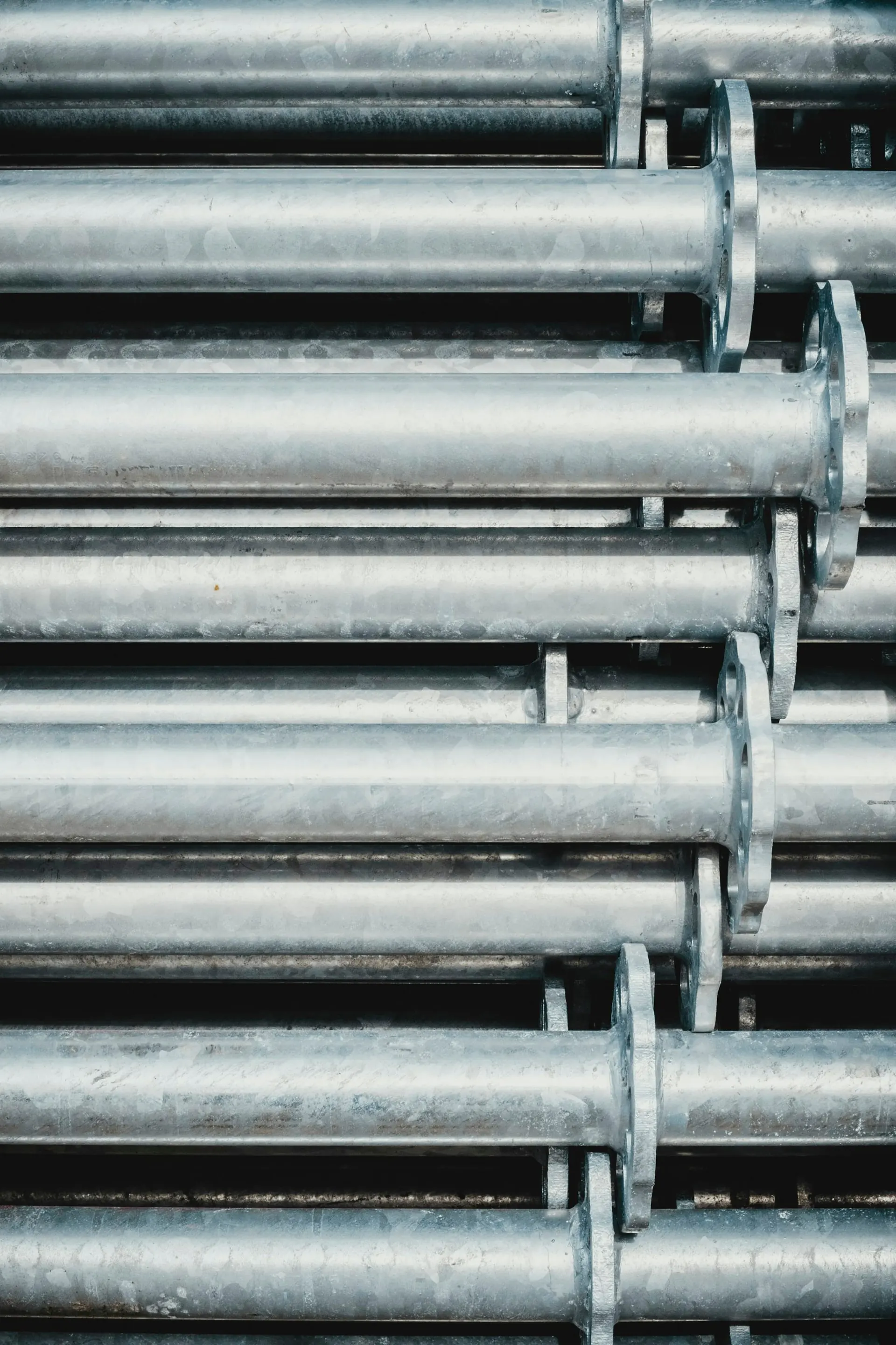 Galvanised steel pipes stacked on a rack