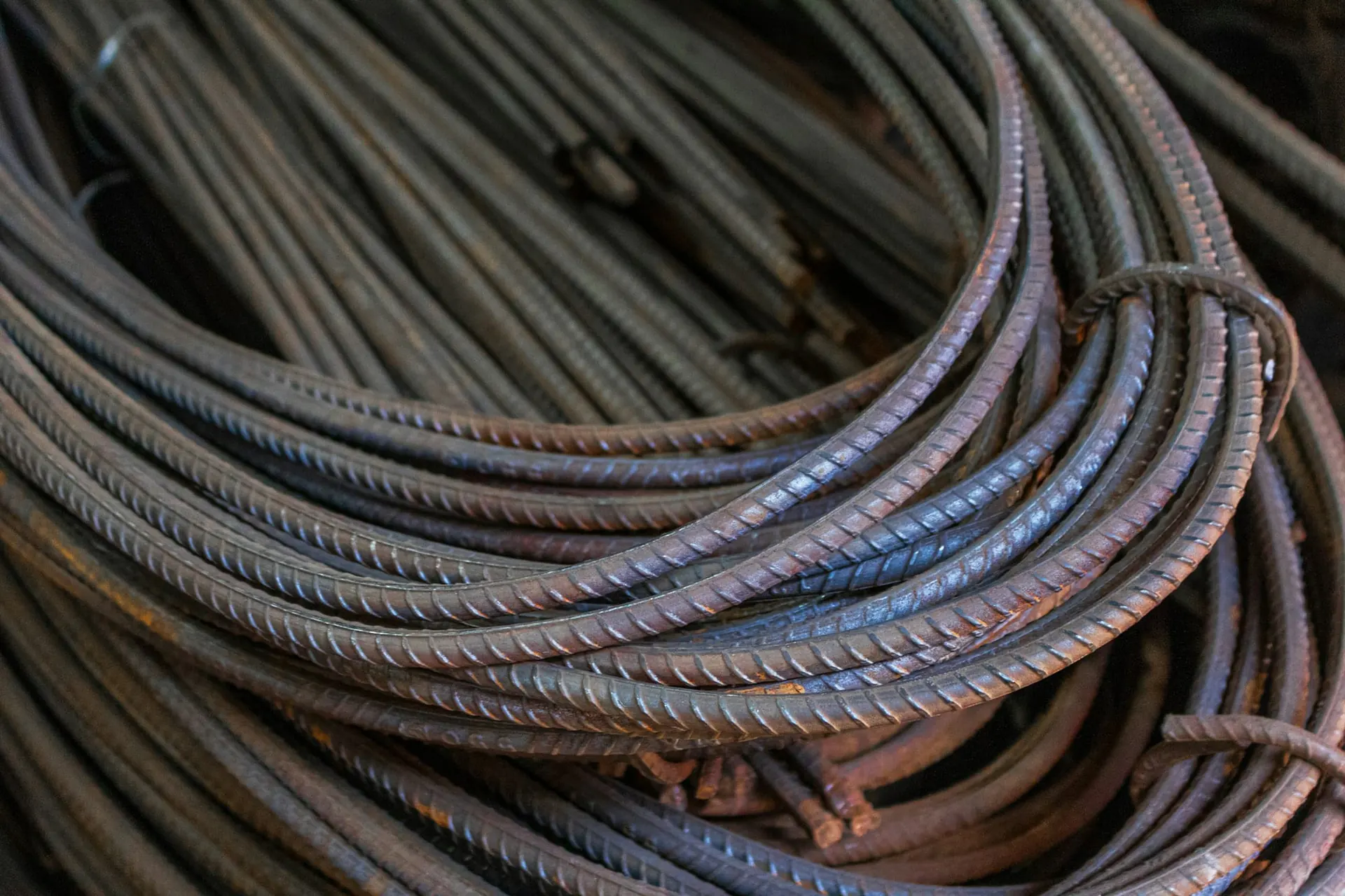 Coiled ribbed reinforcement bars bundled for delivery