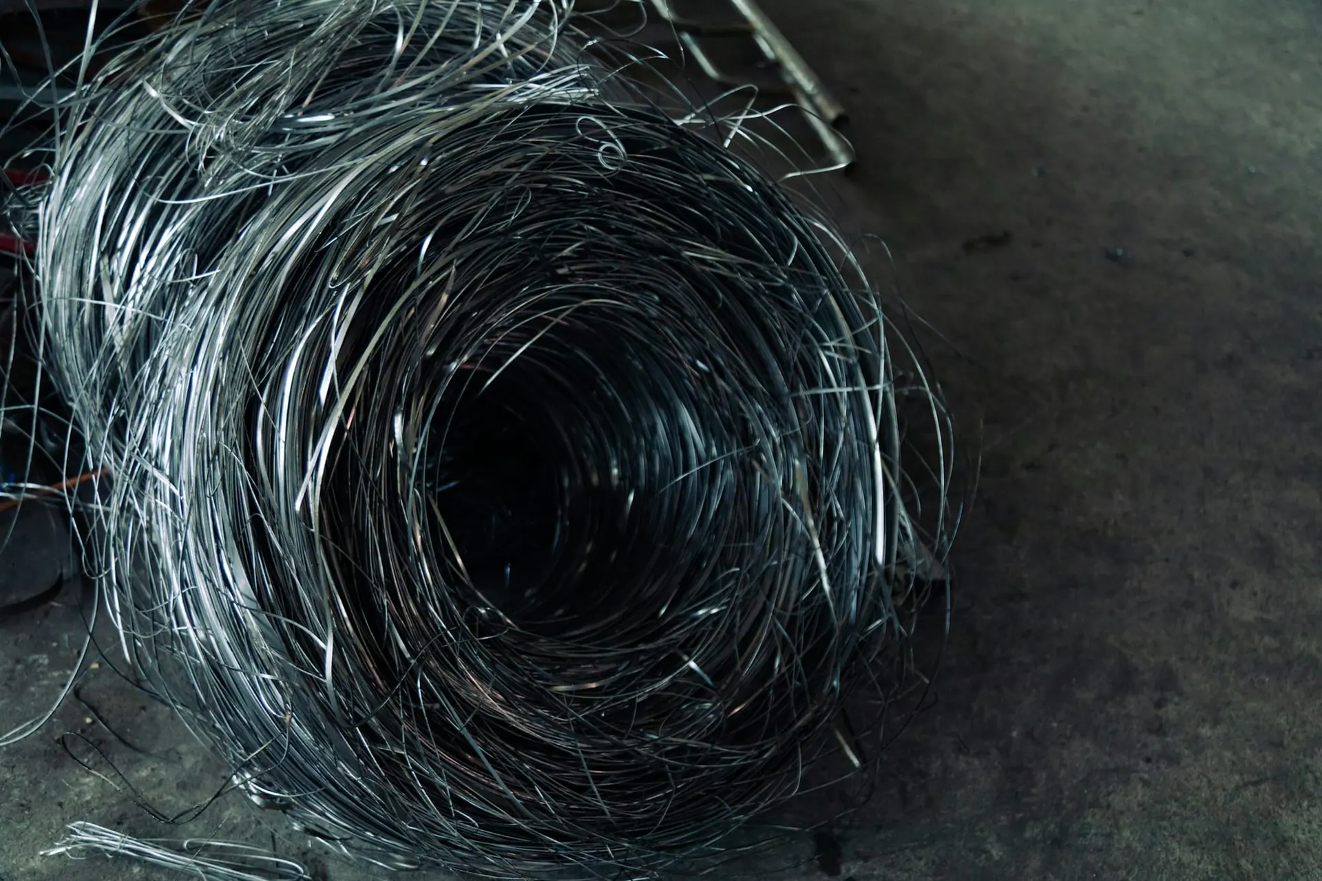 Coil of steel wire on a floor