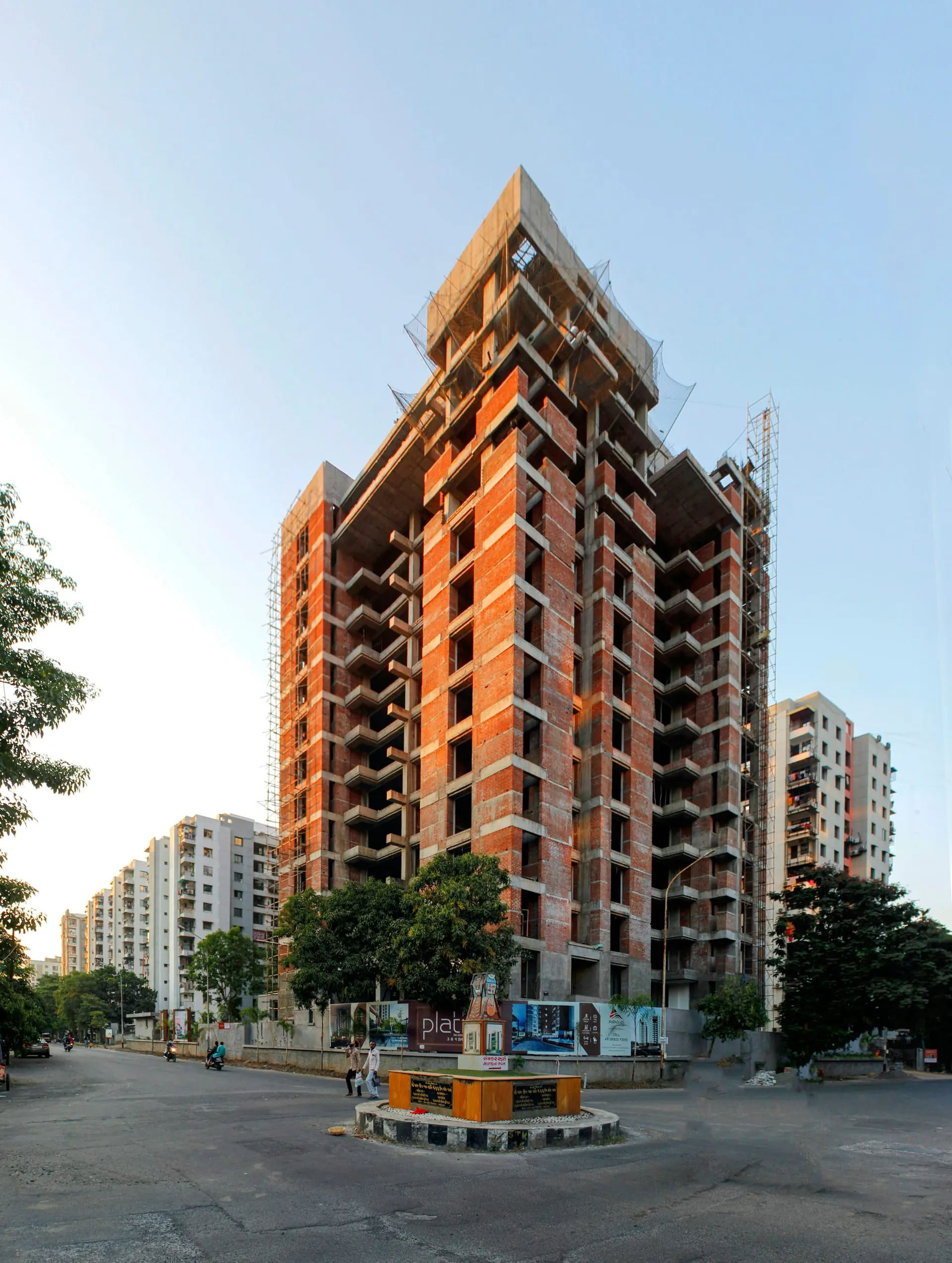 High-rise building under construction with scaffolding