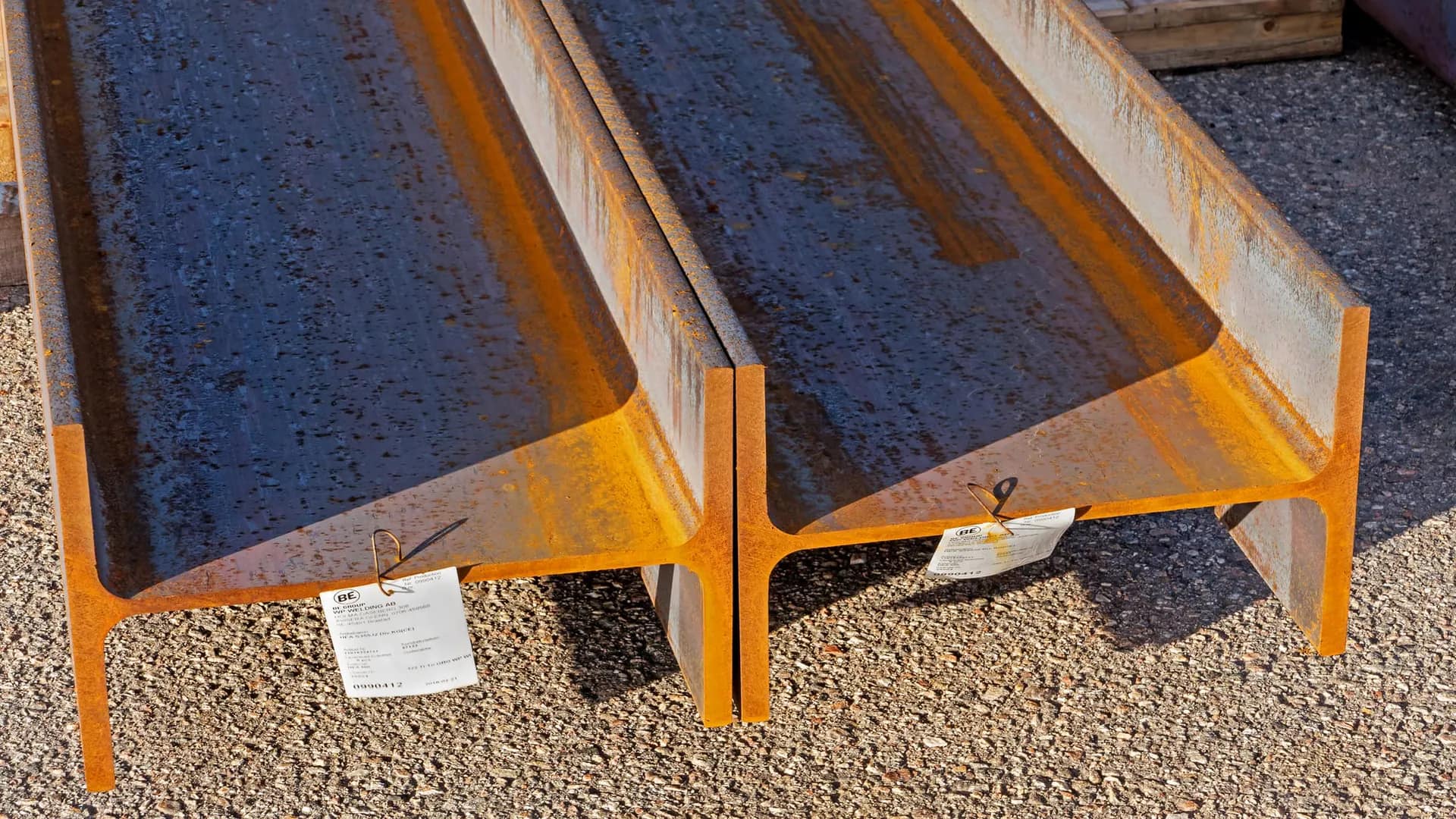 Steel I-beams stored in a fabrication yard
