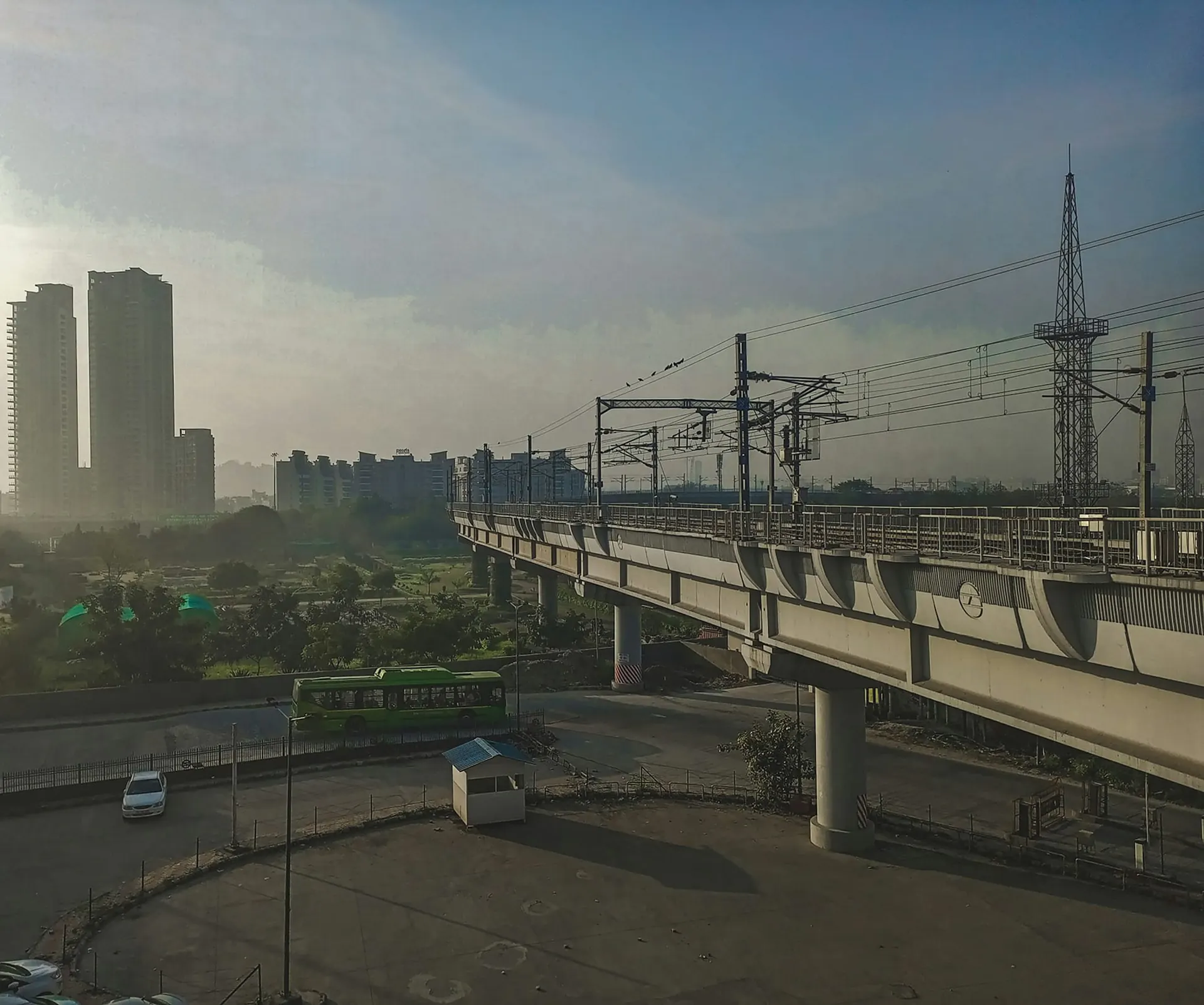 Elevated metro line crossing an Indian cityscape