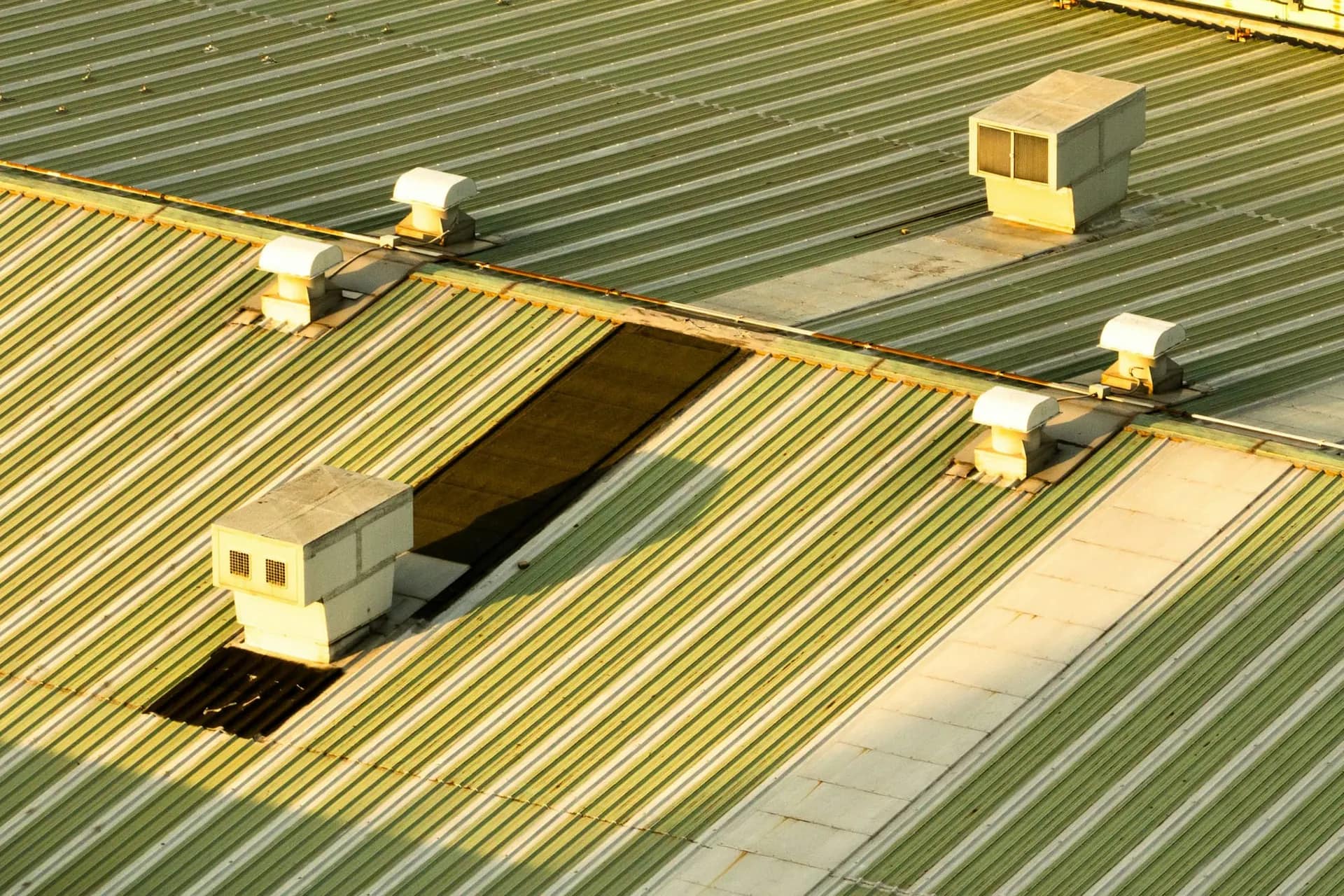 Colour coated metal roof of an industrial building