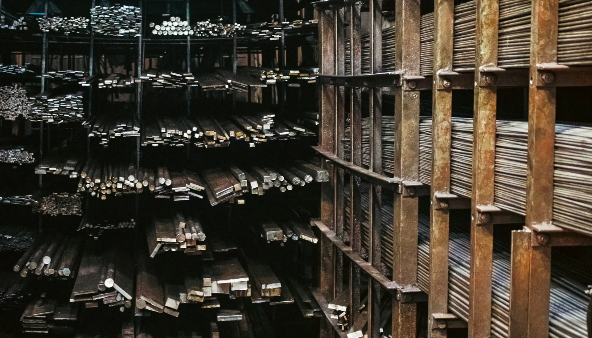 Steel bars and flats stored on stockyard racks